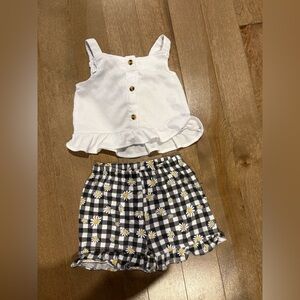 Charming White Ruffle Top and Black Checkered Shorts Set